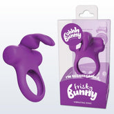 A VeDO Frisky Bunny Vibrating Cock Ring in purple is displayed beside its packaging. The box features the text "Ohhh Bunny" and "I'm Rechargeable - VeDO Frisky Bunny Vibrating Cock Ring." This rechargeable vibrating ring offers 5 different vibrating modes and has two buttons for control.